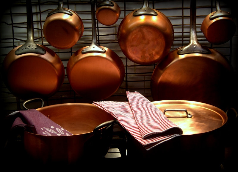 Copper cookware on display